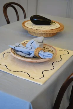 Curved embroidery table cloth